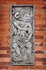 Image showing Mythological character on wall of the temple. Indonesia, Bali