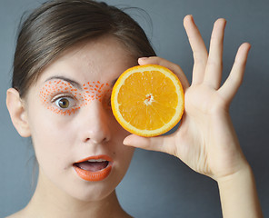 Image showing woman with orange