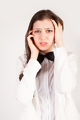 Image showing stressed and depressed young businesswoman