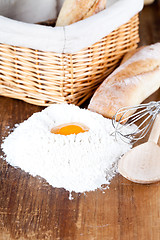 Image showing  bread, flour, eggs and kitchen utensil 