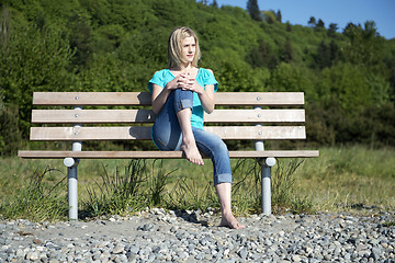 Image showing Woman on bench