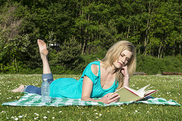 Image showing Reading a book