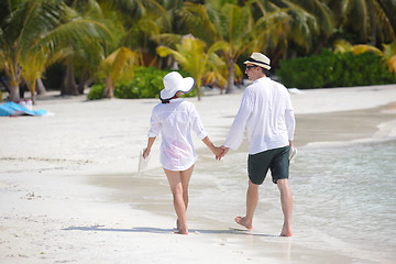 Image showing happy young couple have fun on beach