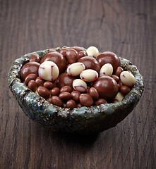 Image showing raisins and nuts covered with chocolate