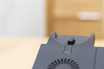 Image showing detail of telephone on wooden desk