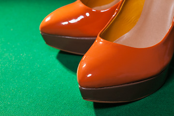 Image showing Female orange shoes