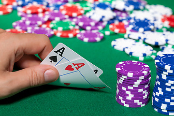Image showing Colorful poker chips and two Ace