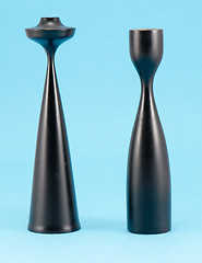 Image showing retro curvy wooden candle sticks paint black blue 