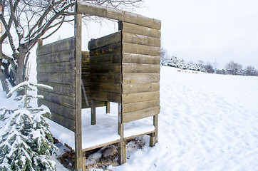 Image showing wooden planks nailed beach changing booth snow 