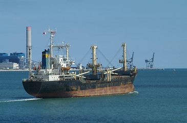 Image showing Freight ship leaving port