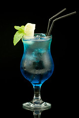 Image showing colourful cocktail on the black background