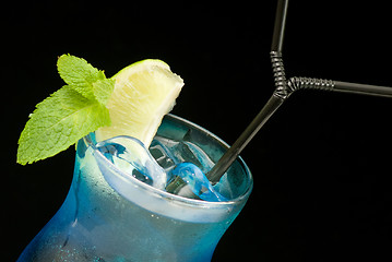 Image showing colourful cocktail closeup on the black background