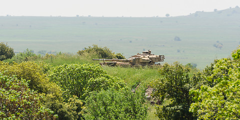 Image showing Israeli tank on combat duty in the field on Golan Heights