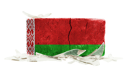 Image showing Brick with broken glass, violence concept