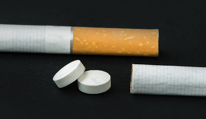 Image showing Cigarette, tobacco and pills