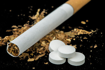 Image showing Cigarette, tobacco and pills