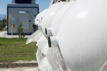 Image showing White industrial butan bottles
