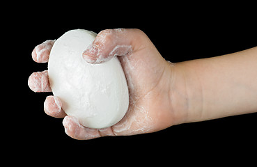 Image showing Lathered hands and soap