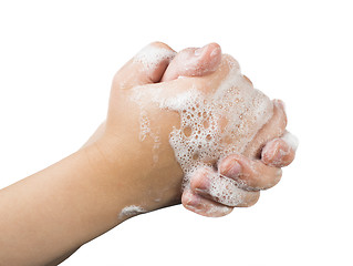 Image showing Lathered hands and soap