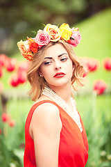 Image showing beautiful woman portrait outdoor with colorful flowers