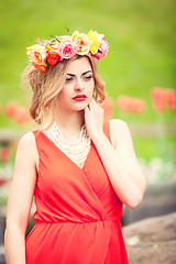 Image showing beautiful woman portrait outdoor with colorful flowers