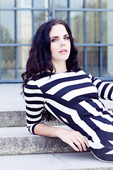 Image showing beautiful woman in sexy dress on stairs summertime