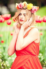 Image showing beautiful woman portrait outdoor with colorful flowers