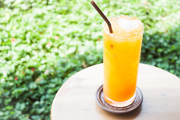 Image showing Chill time with fresh iced orange juice