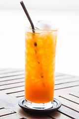 Image showing Full glass of fresh iced orange juice