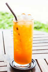 Image showing Fresh pressed tangerine orange juice with iced 