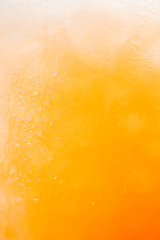 Image showing Natural gradient of iced orange juice and drops