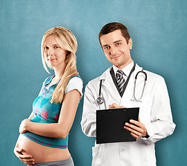 Image showing Pregnant Woman With Doctor
