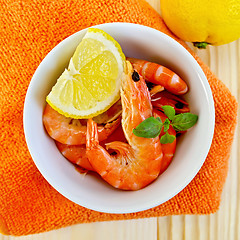 Image showing Shrimp in a white bowl on orange napkin