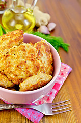 Image showing Fritters chicken in a pink bowl on a napkin
