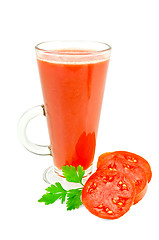 Image showing Juice tomato in a tall glass with parsley