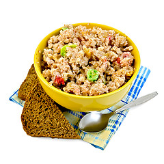 Image showing Porridge rye flakes with two pieces of bread