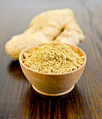 Image showing Ginger powder in a bowl with the root