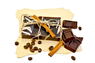 Image showing Soap homemade dark with a chocolate on paper