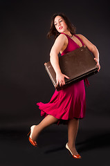 Image showing Pretty woman with suitcase