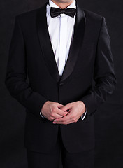 Image showing Stylish man in elegant black tuxedo