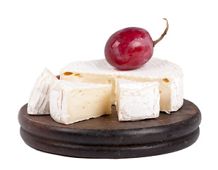 Image showing cheeses on the wooden board