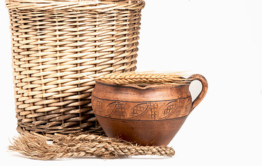 Image showing wattled basket, clay jug