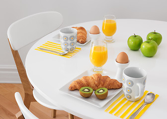 Image showing White table with healthy breakfast