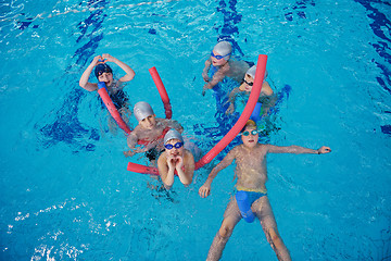 Image showing happy children group  at swimming pool