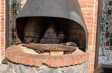 Image showing retro hearth fireplace brick wall outdoor closeup 