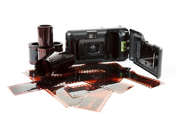 Image showing analog photo camera and color negative films