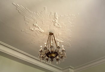 Image showing Chandelier and stucco