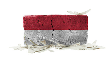 Image showing Brick with broken glass, violence concept