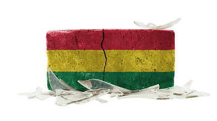 Image showing Brick with broken glass, violence concept