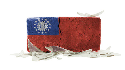 Image showing Brick with broken glass, violence concept